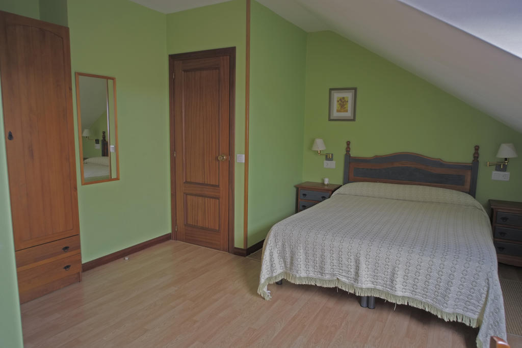 Maison d'hôtes La Rectoral De San Juan à El Franco Chambre photo
